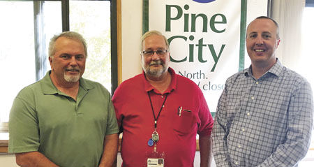 Pine City Fire Marshal Dave Hill passes the torch